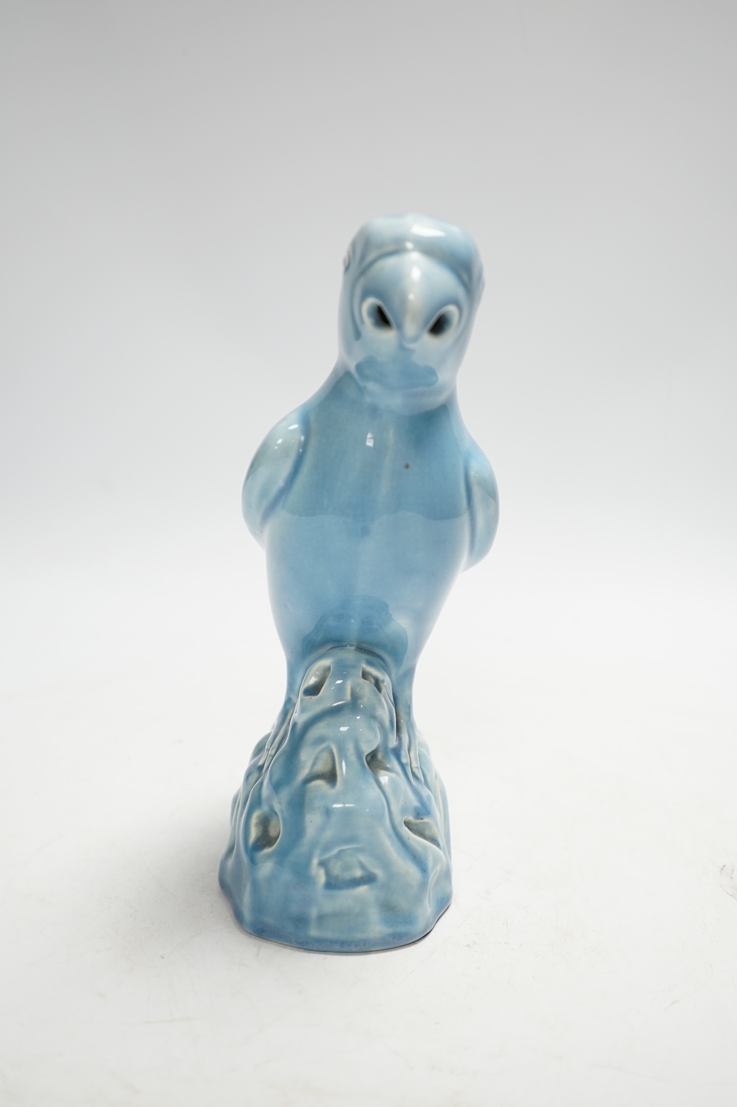 An Art Deco Mintons blue glazed parrot, 22cm high